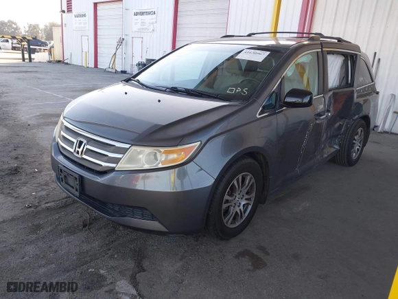 2012 Honda Odyssey EX with VIN 5FNRL5H41CB067103, listed as a IAAI auction lot 41630967 with 117,996 mi miles. Bid and sale history available at carsss.com. Image 2.