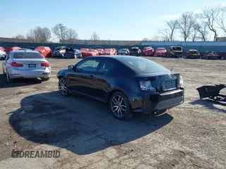2014 Scion tC with VIN JTKJF5C78E3074094, listed as a IAAI auction lot 41828785 with 164,976 mi miles. Bid and sale history available at carsss.com. Image 3.