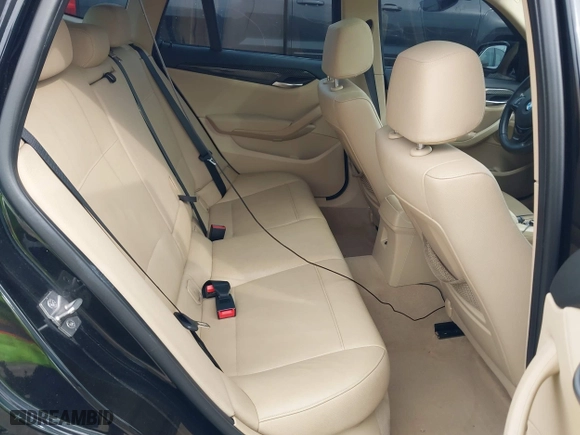 2014 BMW X1 sDrive28i with VIN WBAVM1C54EVW46561, listed as a IAAI auction lot 41880387 with 125,096 mi miles. Bid and sale history available at carsss.com. Image 8.