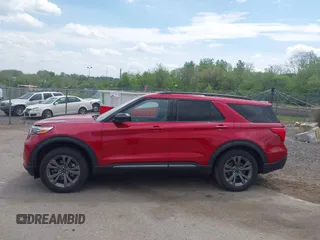 2022 Ford Explorer XLT z VIN 1FMSK8DH4NGC35593, wystawiony jako IAAI lot #42167354 z przebiegiem 29 747 mil mil oraz . Historia ofert i sprzedaży dostępna na DreamBid. Obrazek 14.