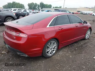 2014 Lincoln MKZ with VIN 3LN6L2GK3ER813789, listed as a IAAI auction lot 42884384 with 158,561 mi miles and . Bid and sale history available at DreamBid. Image 4.