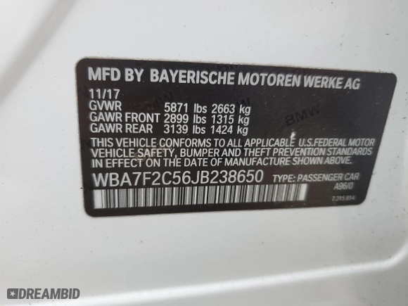 2018 BMW 7 Series 750i xDrive with VIN WBA7F2C56JB238650, listed as a Copart auction lot 64738314 with 96,889 mi miles and Salvage Title. Bid and sale history available at carsss.com. Image 12.