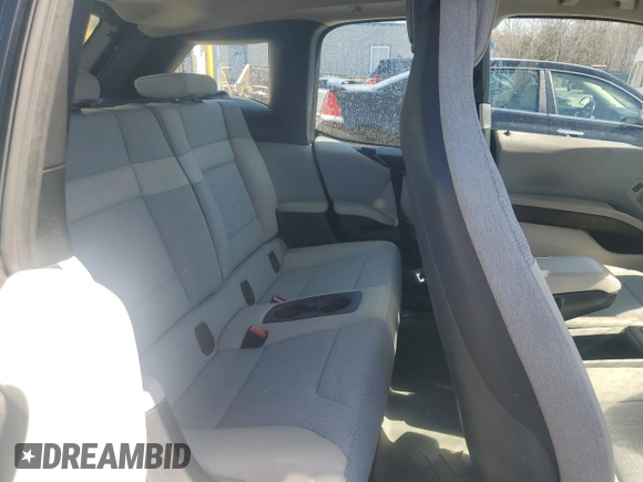 2015 BMW i3 z VIN WBY1Z4C51FV502745, wystawiony jako Copart lot #51739575 z przebiegiem Nie podano mil oraz Szkoda całkowita • Salvage title. Historia ofert i sprzedaży dostępna na DreamBid. Obrazek 10.