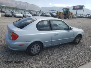 2005 Hyundai Accent GLS with VIN KMHCG35C55U341192, listed as a Copart auction lot 70708994 with 174,872 mi miles and Salvage Title. Bid and sale history available at carsss.com. Image 3.