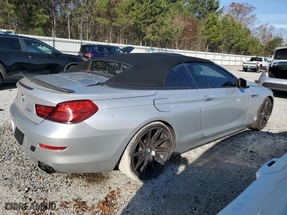 2012 BMW 6 Series 650i with VIN WBALZ3C54CDL72480, listed as a Copart auction lot 82797714 with 114,154 mi miles and Clean Title. Bid and sale history available at carsss.com. Image 3.