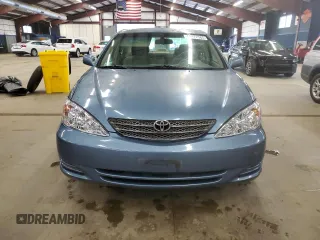 2004 Toyota Camry LE z VIN 4T1BE32K94U820825, wystawiony jako Copart lot #60972565 z przebiegiem 198 899 mil mil oraz Czysty tytuł • Clean title. Historia ofert i sprzedaży dostępna na DreamBid. Obrazek 5.