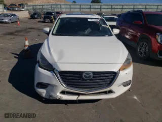 2018 Mazda Mazda3 4-Door Grand Touring with VIN 3MZBN1W37JM190411, listed as a Copart auction lot 77014134 with 69,185 mi miles and Salvage Title. Bid and sale history available at carsss.com. Image 5.