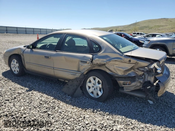 2003 Ford Taurus LX Standard z VIN 1FAFP52U63G277370, wystawiony jako Copart lot #56184345 z przebiegiem 115 778 mil mil oraz Szkoda całkowita • Salvage title. Historia ofert i sprzedaży dostępna na DreamBid. Obrazek 2.