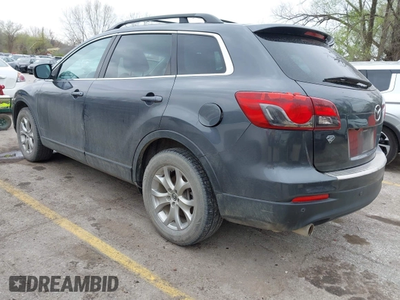 2015 Mazda CX-9 Touring with VIN JM3TB3CA3F0460864, listed as a IAAI auction lot 41944957 with 242,100 mi miles. Bid and sale history available at carsss.com. Image 3.