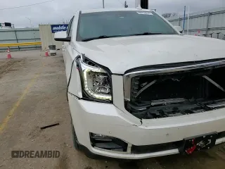 2015 GMC Yukon Denali with VIN 1GKS1CKJ1FR619793, listed as a Copart auction lot 86910314 with 128,559 mi miles and Salvage Title. Bid and sale history available at carsss.com. Image 12.