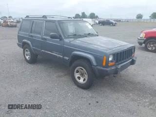 2001 Jeep Cherokee Sport z VIN 1J4FT48S61L594229, wystawiony jako IAAI lot #42520336 z przebiegiem 190 862 mil mil oraz . Historia ofert i sprzedaży dostępna na DreamBid. Obrazek 1.