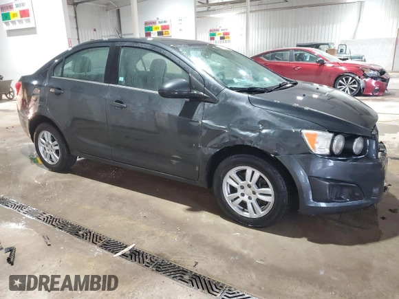2014 Chevrolet Sonic LT with VIN 1G1JC5SH4E4239958, listed as a Copart auction lot 46082295 with 128,275 mi miles and Salvage Title. Bid and sale history available at DreamBid. Image 4.