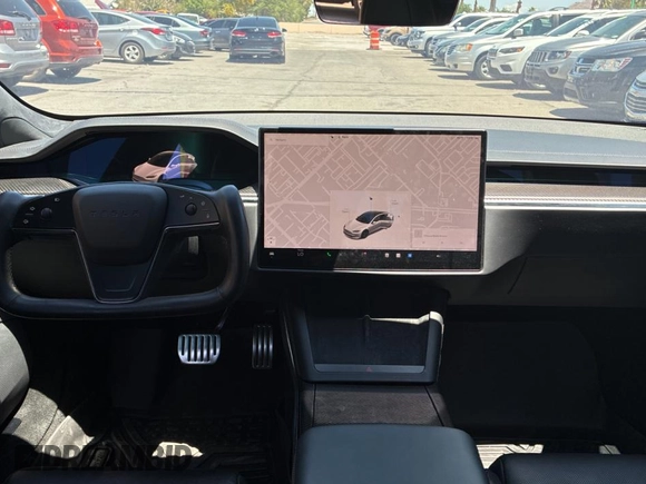 2021 Tesla Model S Plaid с VIN 5YJSA1E64MF447124, выставлен на аукционе Copart как лот 55833265 с пробегом 61 623 миль миль и Чистый • Clean title. История ставок и продаж доступна на DreamBid. Изображение 9.