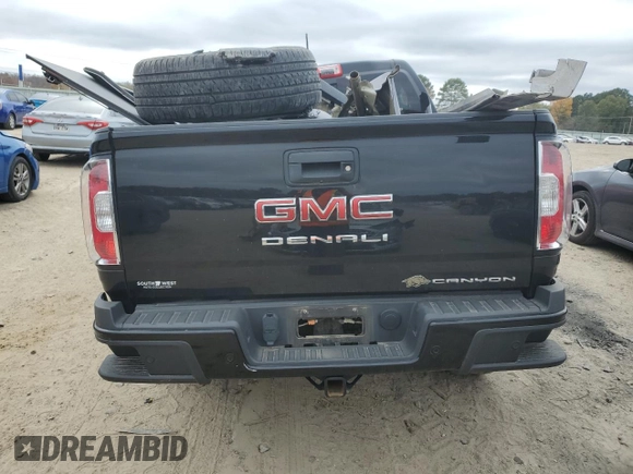 2022 GMC Canyon 2WD Denali with VIN 1GTG5EEN3N1107952, listed as a Copart auction lot 76716143 with 0 mi miles and Salvage Title. Bid and sale history available at carsss.com. Image 6.