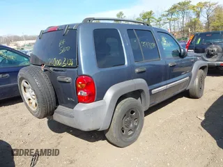 2002 Jeep Liberty Sport with VIN 1J4GL48KX2W319774, listed as a IAAI auction lot 41907101 with Not Provided miles. Bid and sale history available at carsss.com. Image 4.