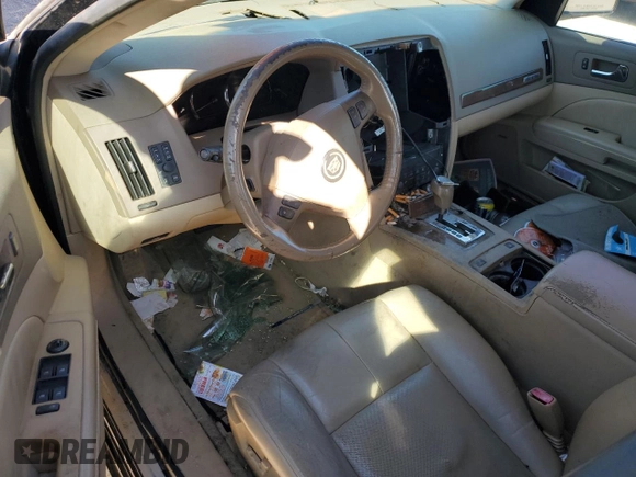 2005 Cadillac STS with VIN 1G6DC67A250139275, listed as a Copart auction lot 48378105 with 127,890 mi miles and Salvage Title. Bid and sale history available at DreamBid. Image 8.