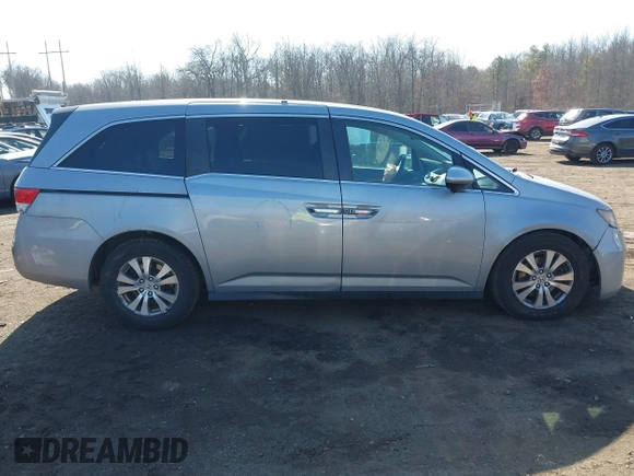 2016 Honda Odyssey EX-L z VIN 5FNRL5H6XGB095280, wystawiony jako IAAI lot #41513674 z przebiegiem 124 239 mil mil oraz . Historia ofert i sprzedaży dostępna na DreamBid. Obrazek 13.