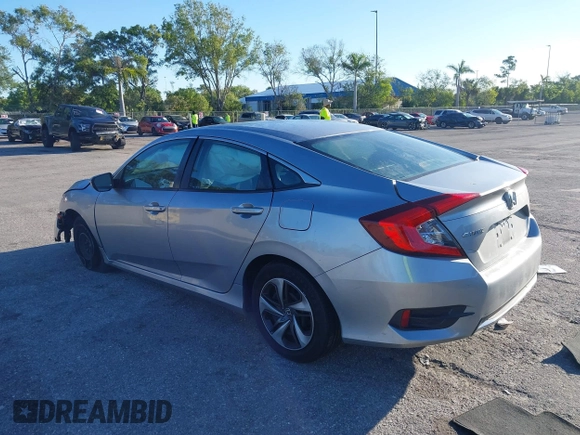 2020 Honda Civic LX with VIN 19XFC2F63LE004953, listed as a IAAI auction lot 41824922 with 71,458 mi miles and . Bid and sale history available at DreamBid. Image 3.