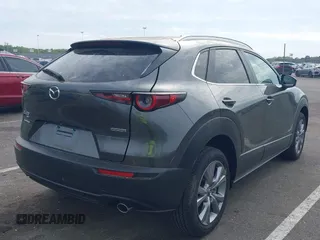 2024 Mazda CX-30 S Carbon Edition with VIN 3MVDMBCM5RM665341, listed as a IAAI auction lot 42180459 with 4,496 mi miles and . Bid and sale history available at DreamBid. Image 4.