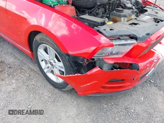 2014 Ford Mustang V6 with VIN 1ZVBP8AMXE5223660, listed as a IAAI auction lot 42009379 with 83,329 mi miles. Bid and sale history available at carsss.com. Image 6.