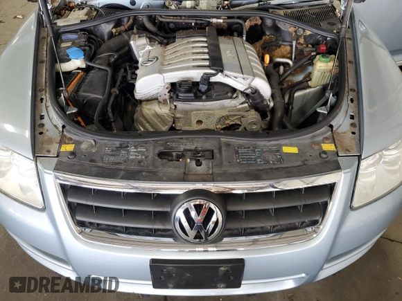 2007 Volkswagen Touareg V6 with VIN WVGZE77LX7D023186, listed as a Copart auction lot 71650314 with 99,577 mi miles and Clean Title. Bid and sale history available at DreamBid. Image 12.