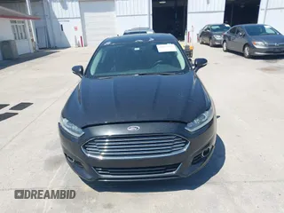 2014 Ford Fusion Titanium with VIN 3FA6P0K9XER216551, listed as a IAAI auction lot 42037004 with 113,857 mi miles and . Bid and sale history available at DreamBid. Image 12.