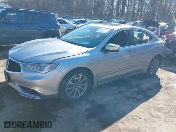 2020 Acura TLX with VIN 19UUB1F38LA000055, listed as a IAAI auction lot 41546988 with 99,036 mi miles. Bid and sale history available at carsss.com. Image 2.
