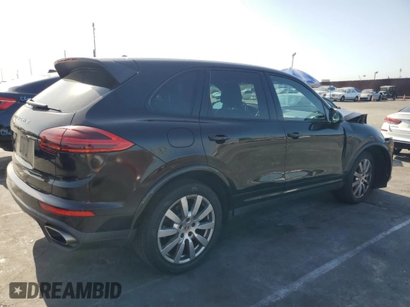 2017 Porsche Cayenne with VIN WP1AA2A20HKA80640, listed as a Copart auction lot 61038585 with 60,893 mi miles and Salvage title. Bid and sale history available at DreamBid. Image 3.