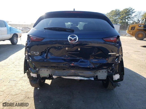 2024 Mazda CX-5 2.5 S Carbon Edition with VIN JM3KFBCL0R0480599, listed as a Copart auction lot 45717485 with 7,448 mi miles and Salvage Title. Bid and sale history available at carsss.com. Image 6.