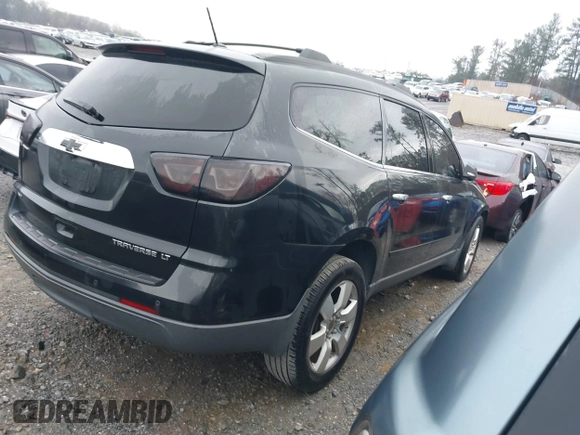 2013 Chevrolet Traverse LT with VIN 1GNKVJKD9DJ124307, listed as a IAAI auction lot 41864010 with 123,458 mi miles and . Bid and sale history available at DreamBid. Image 4.
