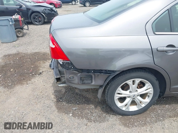 2012 Ford Fusion SE with VIN 3FAHP0HA9CR141588, listed as a IAAI auction lot 42485632 with 124,312 mi miles and . Bid and sale history available at DreamBid. Image 17.
