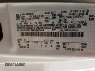 2011 Ford Econoline Passenger XL with VIN 1FBSS3BL8BDB07454, listed as a Copart auction lot 84713284 with 96,635 mi miles and Salvage title. Bid and sale history available at DreamBid. Image 15.