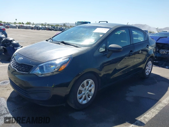 2014 Kia Rio LX with VIN KNADM4A39E6364490, listed as a IAAI auction lot 42128702 with 130,981 mi miles and . Bid and sale history available at DreamBid. Image 18.