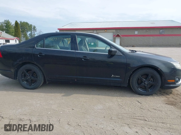 2010 Ford Fusion Hybrid with VIN 3FADP0L35AR168002, listed as a IAAI auction lot 42090134 with 147,831 mi miles. Bid and sale history available at carsss.com. Image 14.