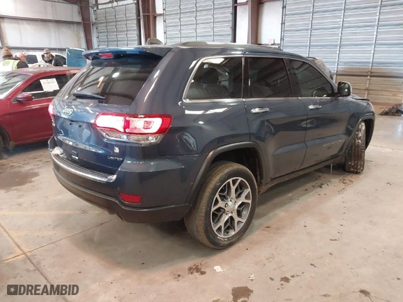 2020 Jeep Grand Cherokee Limited with VIN 1C4RJFBG6LC371720, listed as a IAAI auction lot 41593055 with 73,710 mi miles. Bid and sale history available at carsss.com. Image 4.