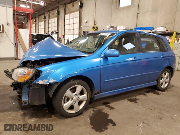 2007 Kia Spectra with VIN KNAFE161775007569, listed as a Copart auction lot 86778784 with 125,463 mi miles and Salvage Title. Bid and sale history available at carsss.com. Image 1.