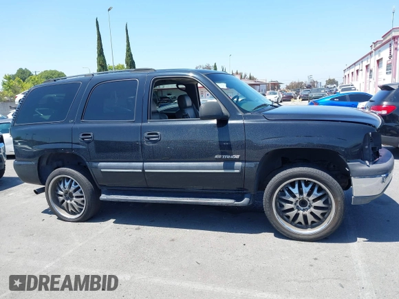 2003 Chevrolet Tahoe LS with VIN 1GNEC13T73R105540, listed as a IAAI auction lot 42313415 with Not provided miles and . Bid and sale history available at DreamBid. Image 13.