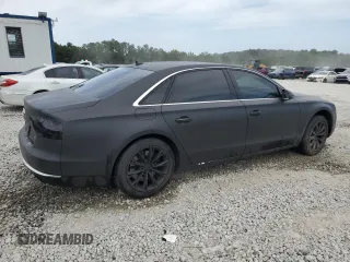 2012 Audi A8 с VIN WAURVAFD4CN017834, выставлен на аукционе Copart как лот 56951795 с пробегом 154 564 миль миль и Списание • Salvage title. История ставок и продаж доступна на DreamBid. Изображение 3.