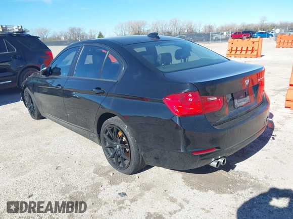 2015 BMW 3 Series 328i with VIN WBA3A5C58FF609161, listed as a IAAI auction lot 41162704 with 117,190 mi miles. Bid and sale history available at carsss.com. Image 3.