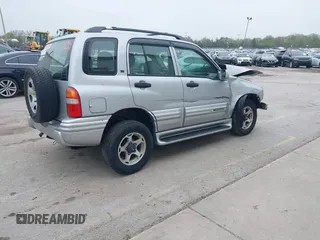 2001 Chevrolet Tracker LT z VIN 2CNBJ634916959876, wystawiony jako IAAI lot #42166992 z przebiegiem 97 878 mil mil oraz . Historia ofert i sprzedaży dostępna na DreamBid. Obrazek 4.