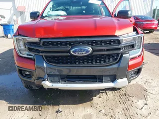 2024 Ford Ranger XLT z VIN 1FTER4HH8RLE62816, wystawiony jako IAAI lot #41961450 z przebiegiem 6 399 mil mil oraz . Historia ofert i sprzedaży dostępna na DreamBid. Obrazek 6.