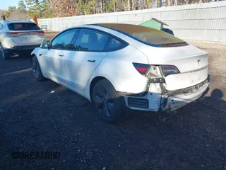 2018 Tesla Model 3 Long Range Battery with VIN 5YJ3E1EA0JF153146, listed as a IAAI auction lot 41621919 with 76,794 mi miles and . Bid and sale history available at DreamBid. Image 3.
