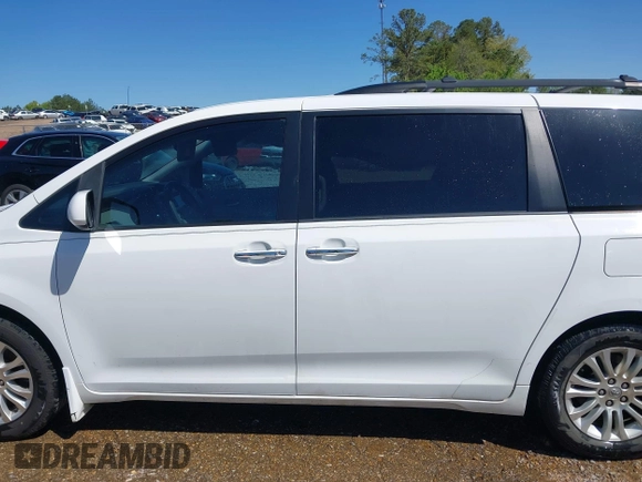 2014 Toyota Sienna XLE z VIN 5TDYK3DC7ES431782, wystawiony jako IAAI lot #41975182 z przebiegiem 191 870 mil mil oraz . Historia ofert i sprzedaży dostępna na DreamBid. Obrazek 15.