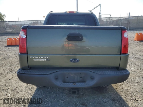2004 Ford Explorer Sport Trac XLS with VIN 1FMZU67K64UA39174, listed as a Copart auction lot 61035465 with 196,912 mi miles and Salvage title. Bid and sale history available at DreamBid. Image 6.
