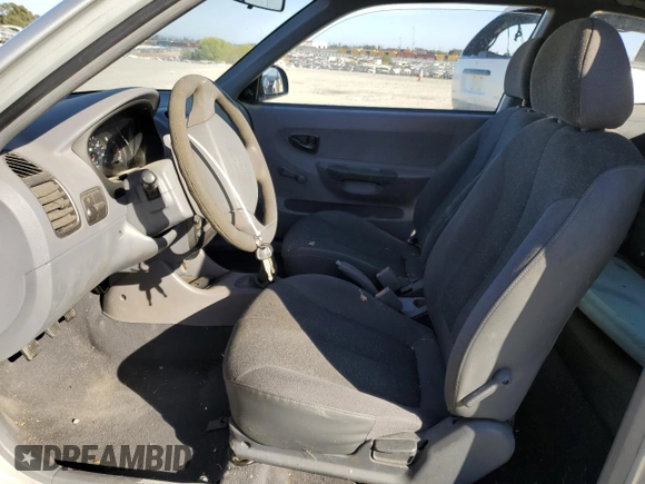 2002 Hyundai Accent с VIN KMHCF35G62U203274, выставлен на аукционе Copart как лот 77047834 с пробегом 90 442 миль миль и Списание • Salvage title. История ставок и продаж доступна на DreamBid. Изображение 7.
