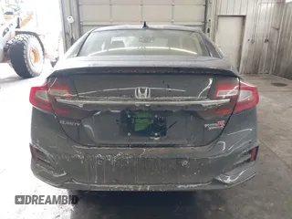 2018 Honda Clarity Touring z VIN JHMZC5F39JC002521, wystawiony jako IAAI lot #41428968 z przebiegiem 64 014 mil mil oraz . Historia ofert i sprzedaży dostępna na DreamBid. Obrazek 17.