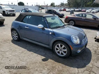 2010 MINI Convertible with VIN WMWMR3C51ATU97217, listed as a Copart auction lot 67732714 with 127,880 mi miles and Clean Title. Bid and sale history available at DreamBid. Image 4.