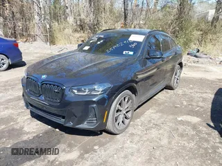 2022 BMW X4 M40i with VIN 5UX43DT04N9K92572, listed as a IAAI auction lot 41985086 with 64,743 mi miles and . Bid and sale history available at DreamBid. Image 17.