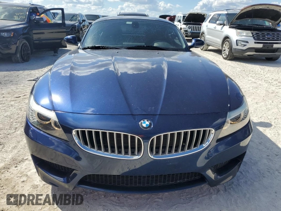 2013 BMW Z4 sDrive35i with VIN WBALM7C58DE385458, listed as a Copart auction lot 77959004 with 43,616 mi miles and Salvage Title. Bid and sale history available at carsss.com. Image 5.