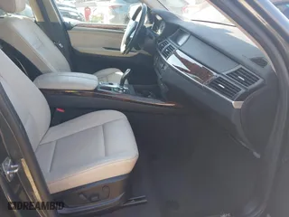 2011 BMW X5 35i with VIN 5UXZV4C51BL740731, listed as a IAAI auction lot 41771257 with 148,638 mi miles. Bid and sale history available at carsss.com. Image 5.